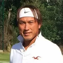 Portrait of David Kung, tennis coach at Blackheath Lawn Tennis Club