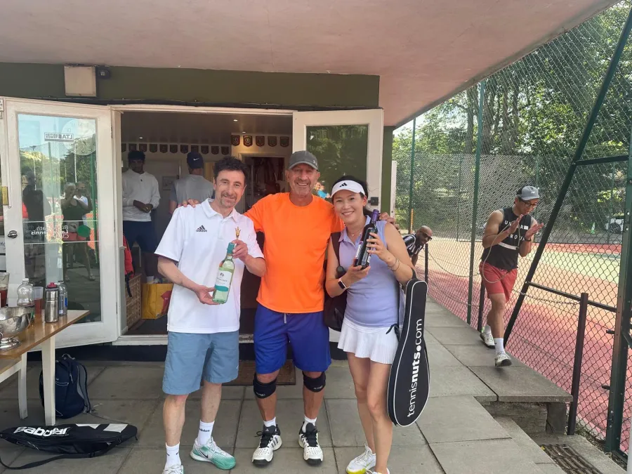Members and their families gathered on the courts for the club's annual charity day